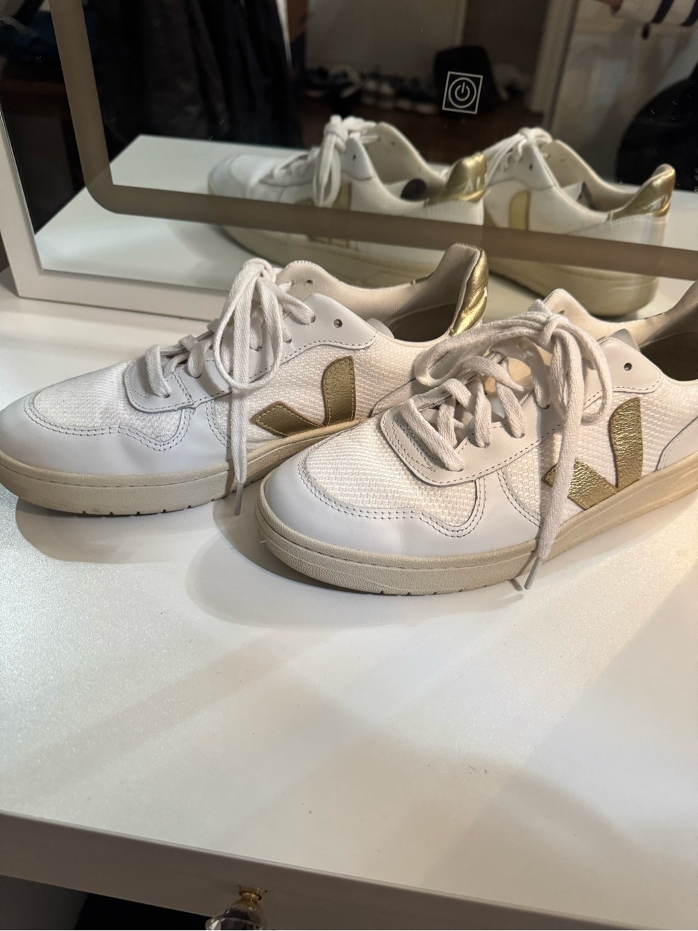 White and Gold Veja Sneakers